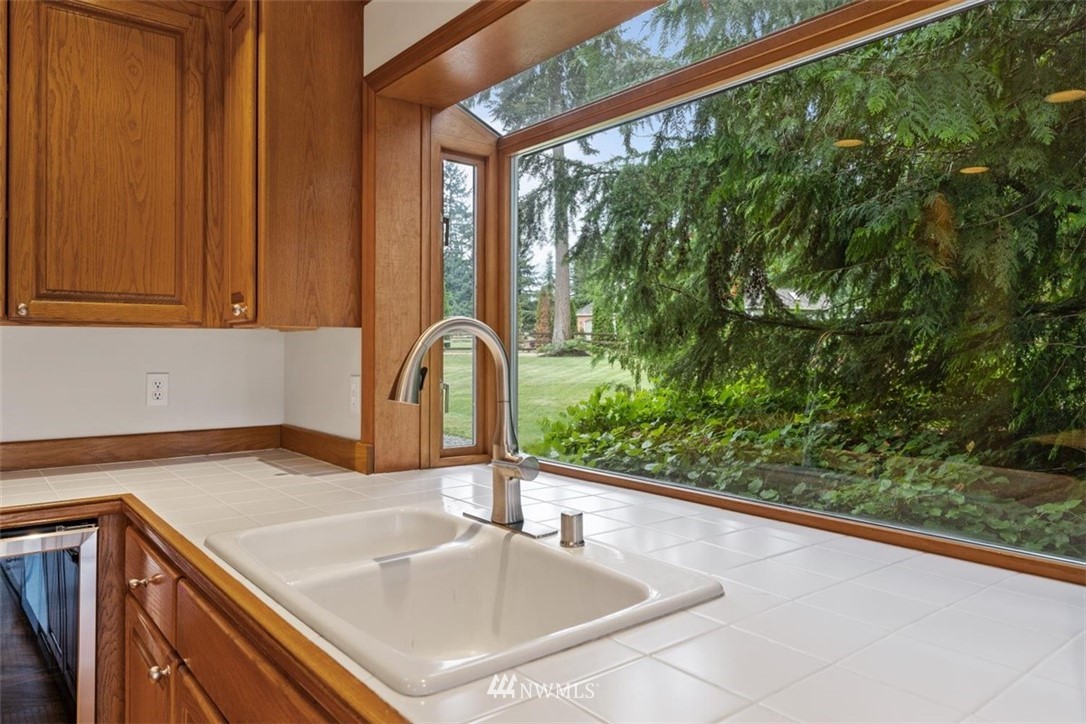 4801 166th Place Southeast Bothell, WA 98012 - Photo 12 of 40 a sink with a window