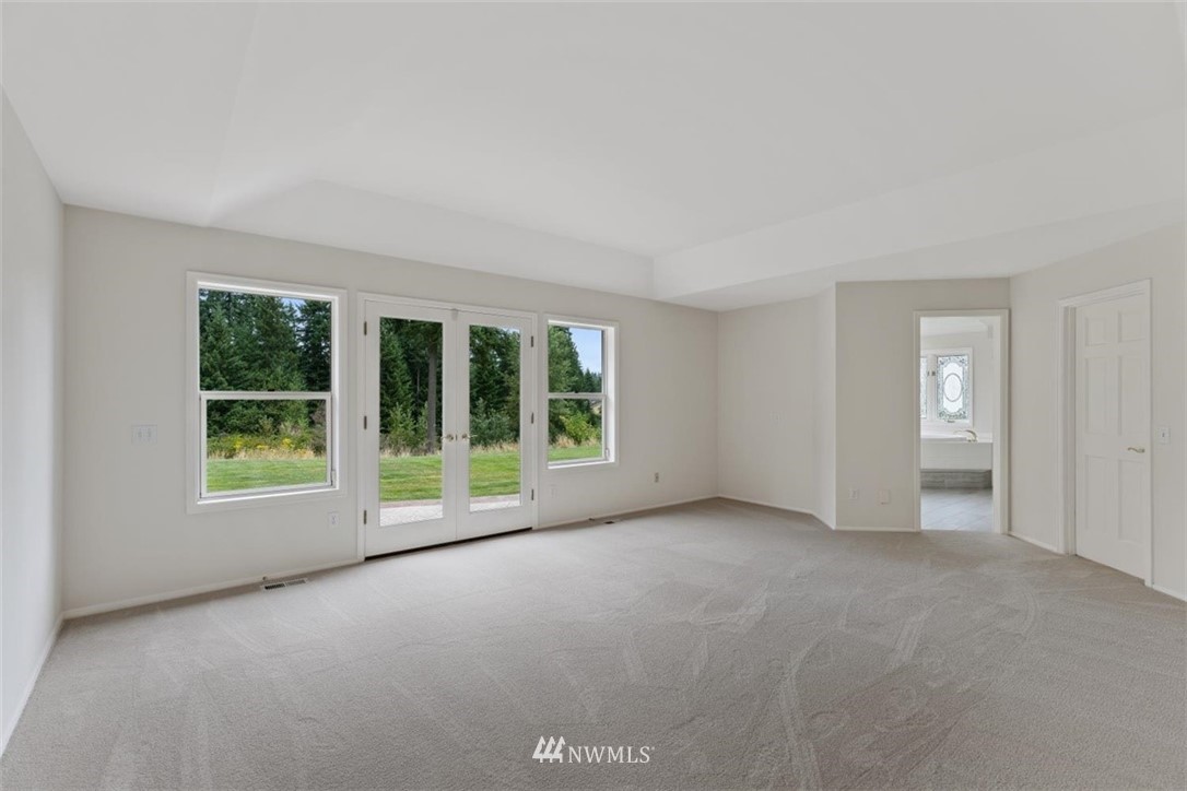 4801 166th Place Southeast Bothell, WA 98012 - Photo 21 of 40 a view of an empty room with a window