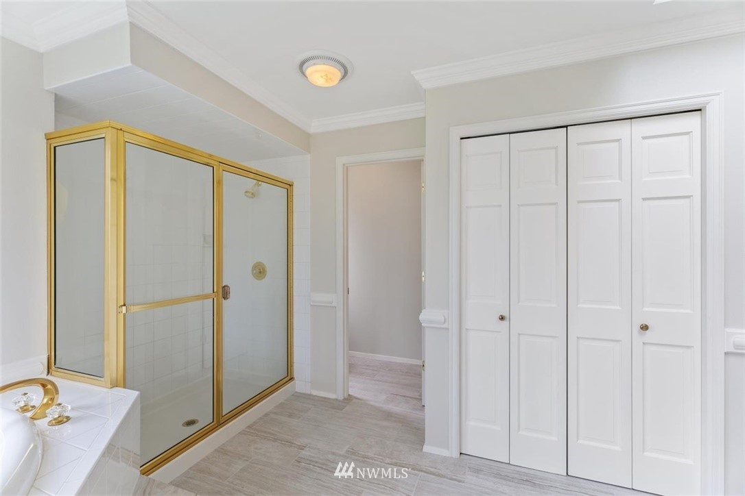 4801 166th Place Southeast Bothell, WA 98012 - Photo 25 of 40 a view of a livingroom with an empty space and a hallway