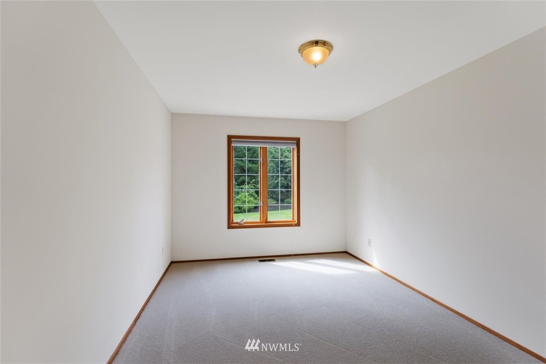 4801 166th Place Southeast Bothell, WA 98012 - Photo 27 of 40 an empty room with a window