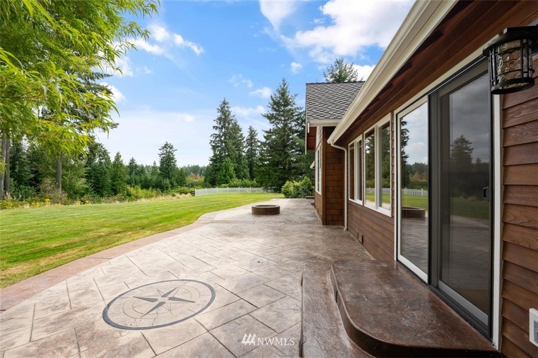 4801 166th Place Southeast Bothell, WA 98012 - Photo 35 of 40 a view of a porch with a backyard