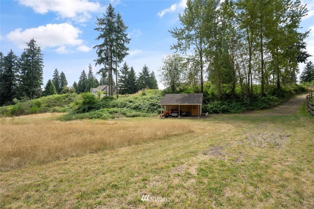 4801 166th Place Southeast Bothell, WA 98012 - Photo 38 of 40 a view of a garden with trees