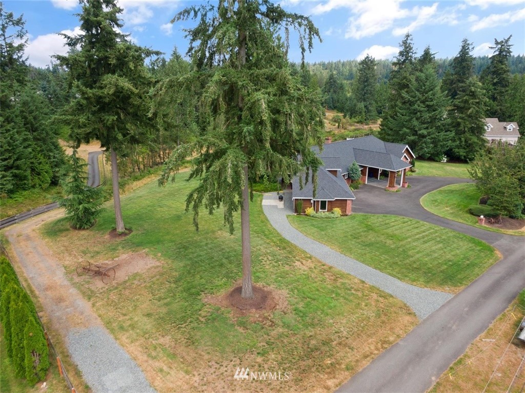 4801 166th Place Southeast Bothell, WA 98012 - Photo 40 of 40 a view of a house with a yard