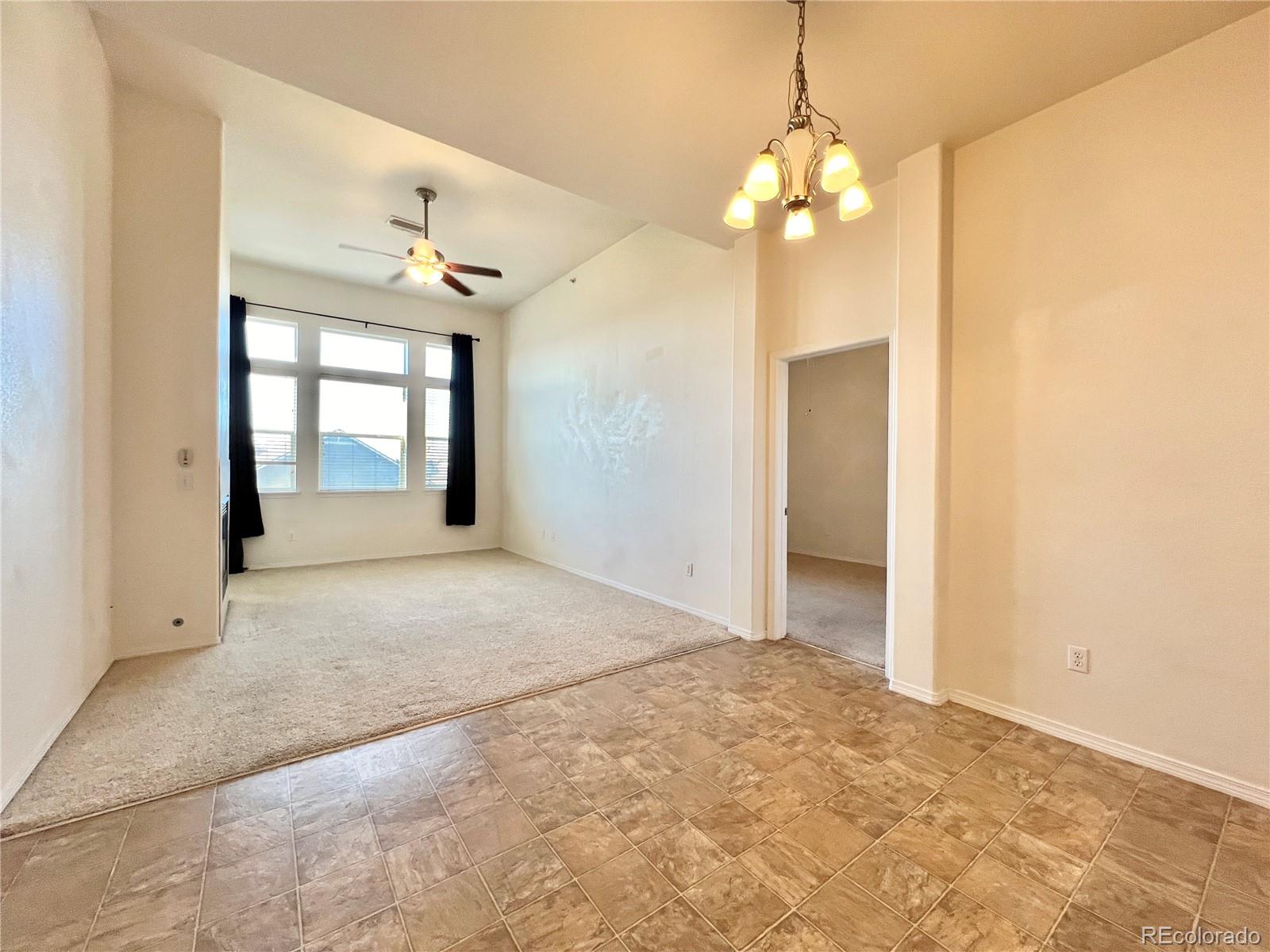 8467 Canyon Rim Circle, Unit 303 Parker, CO 80134 - Photo 9 of 17 a view of livingroom with window