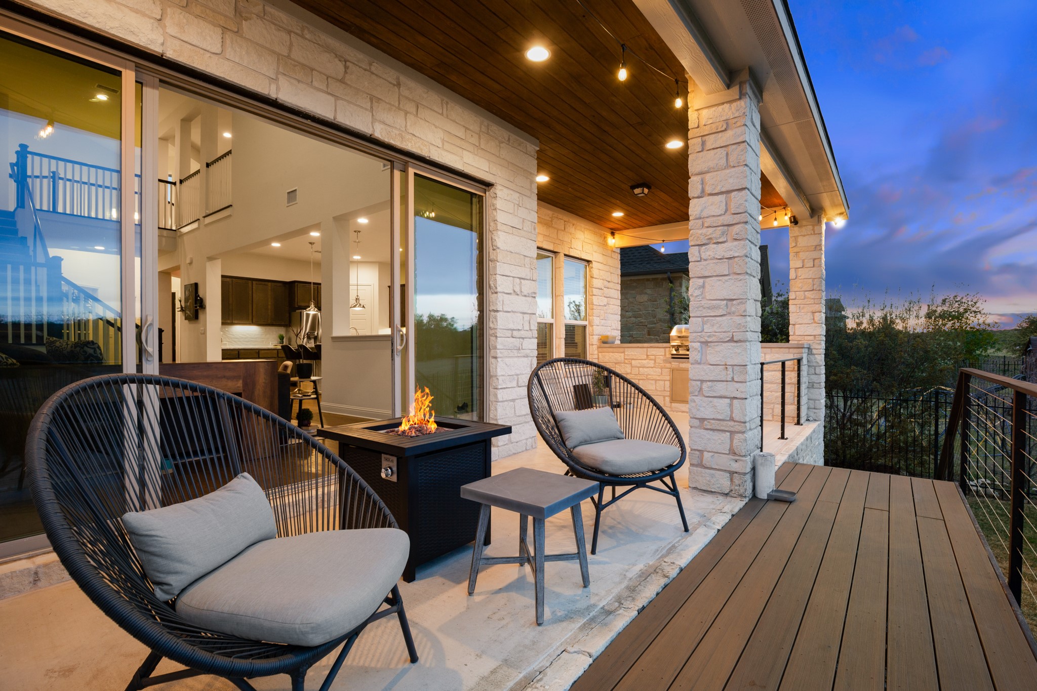 330 Cistern Way Austin, TX 78737 - Photo 4 of 40 a view of a chairs and table in a patio
