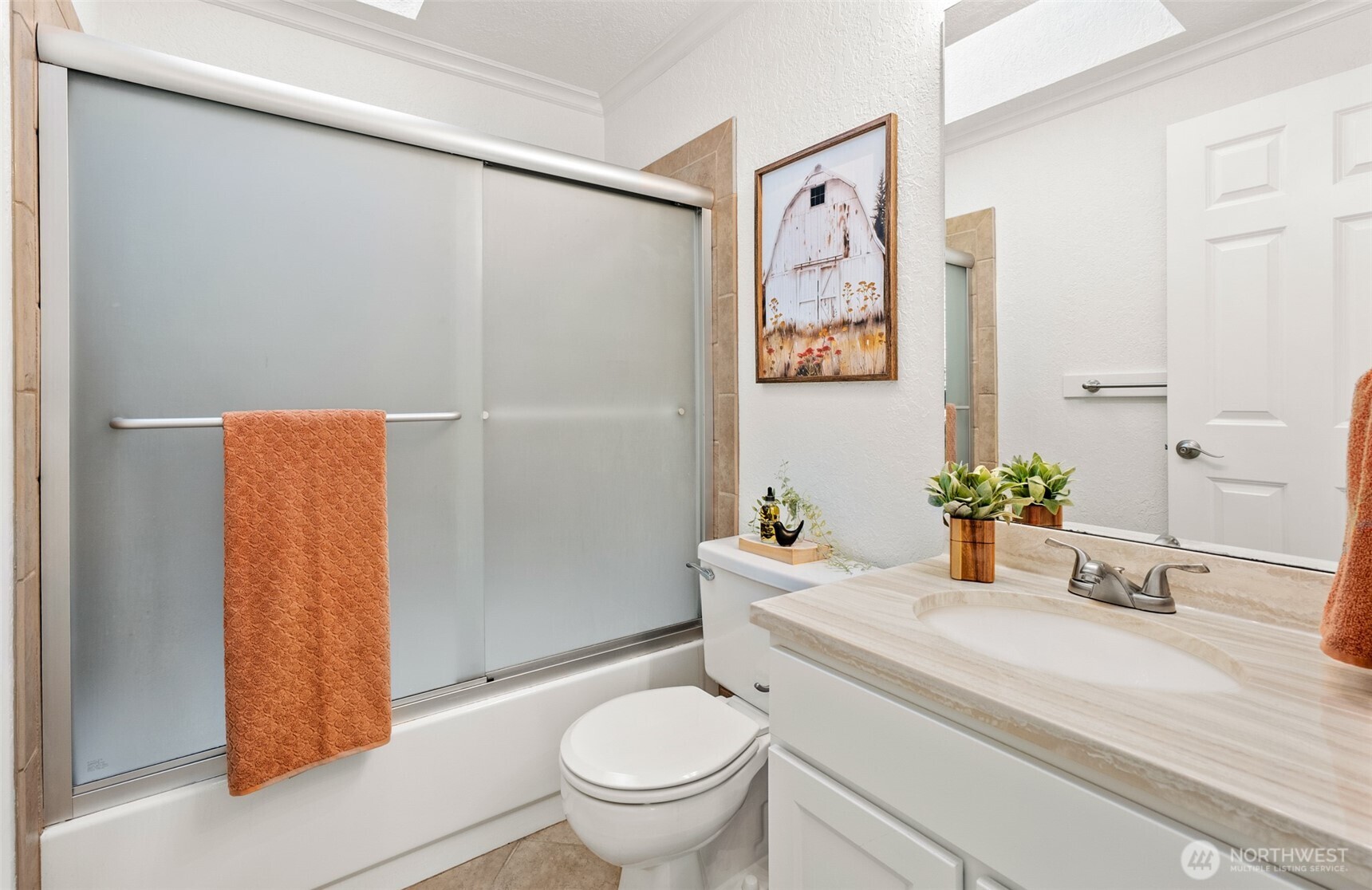 22709 12th Place West Bothell, WA 98021 - Photo 13 of 27 a bathroom with a granite countertop sink mirror vanity and toilet