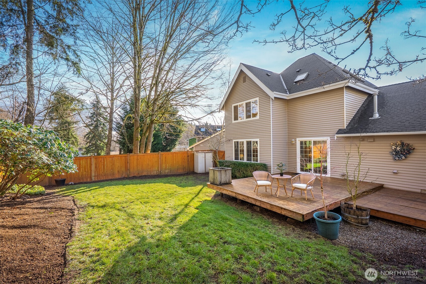 22709 12th Place West Bothell, WA 98021 - Photo 16 of 27 a view of a chairs in a backyard
