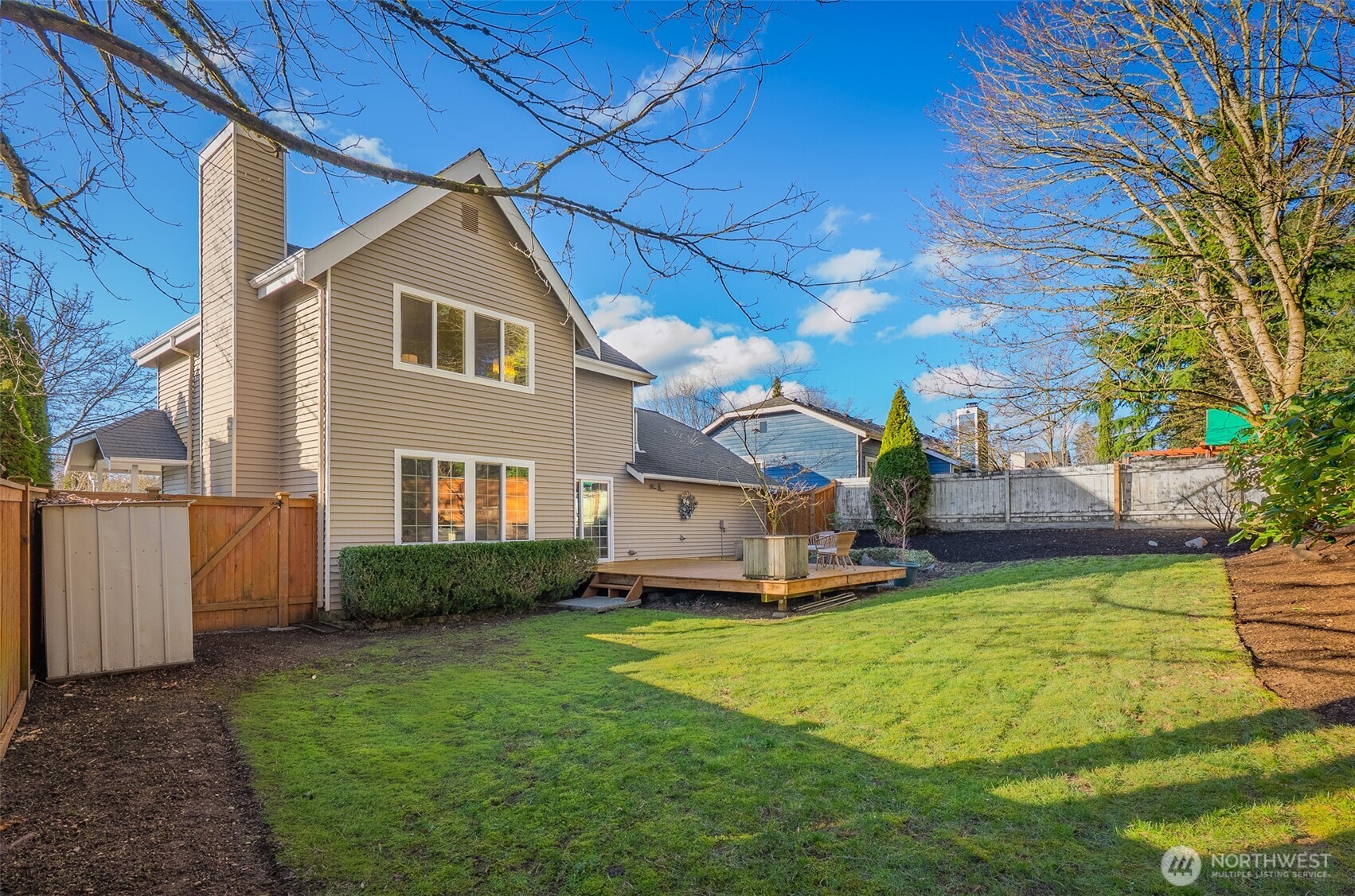 22709 12th Place West Bothell, WA 98021 - Photo 17 of 27 a front view of a house with a yard and garage