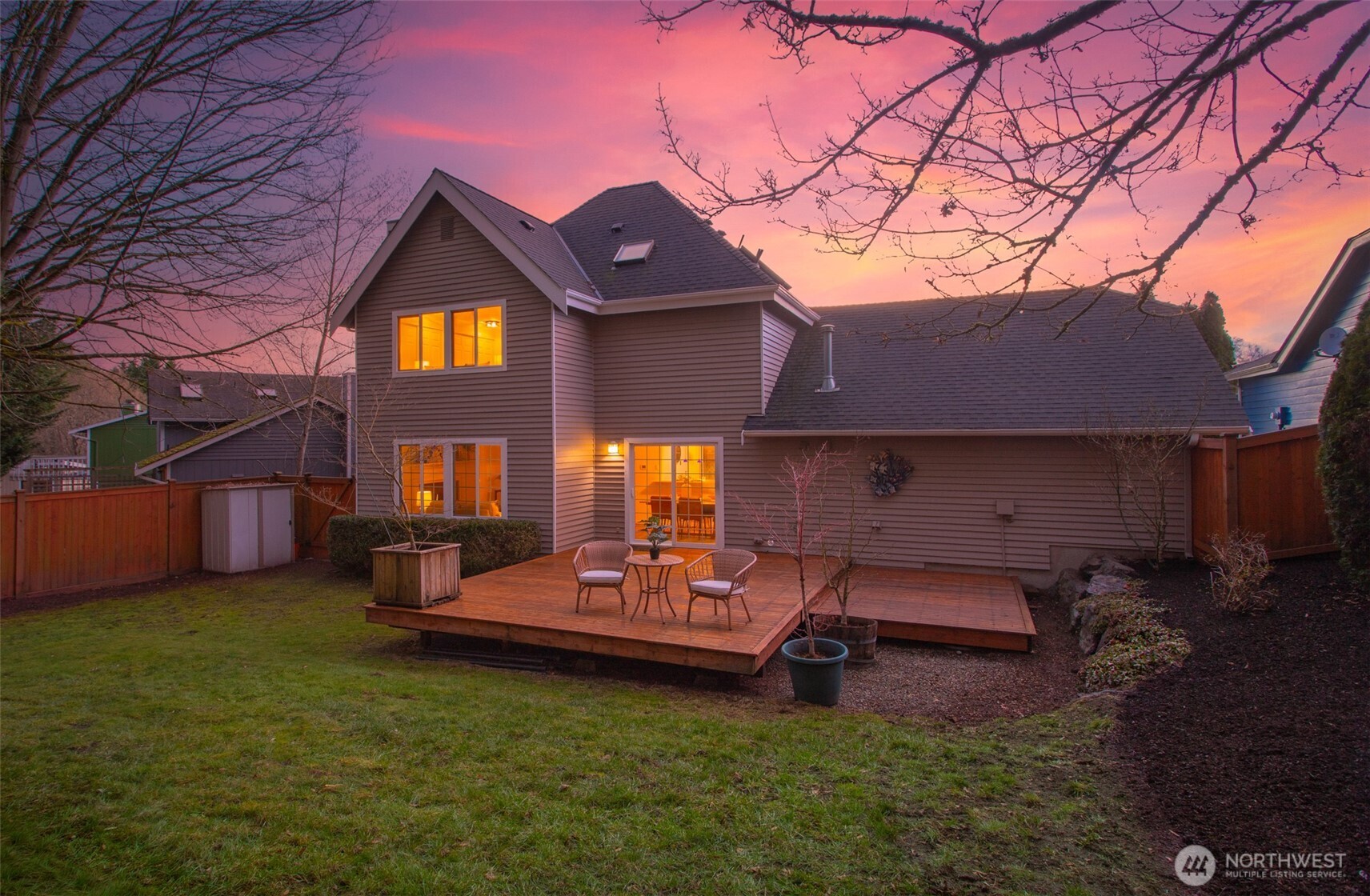 22709 12th Place West Bothell, WA 98021 - Photo 18 of 27 a backyard of a house with table and chairs