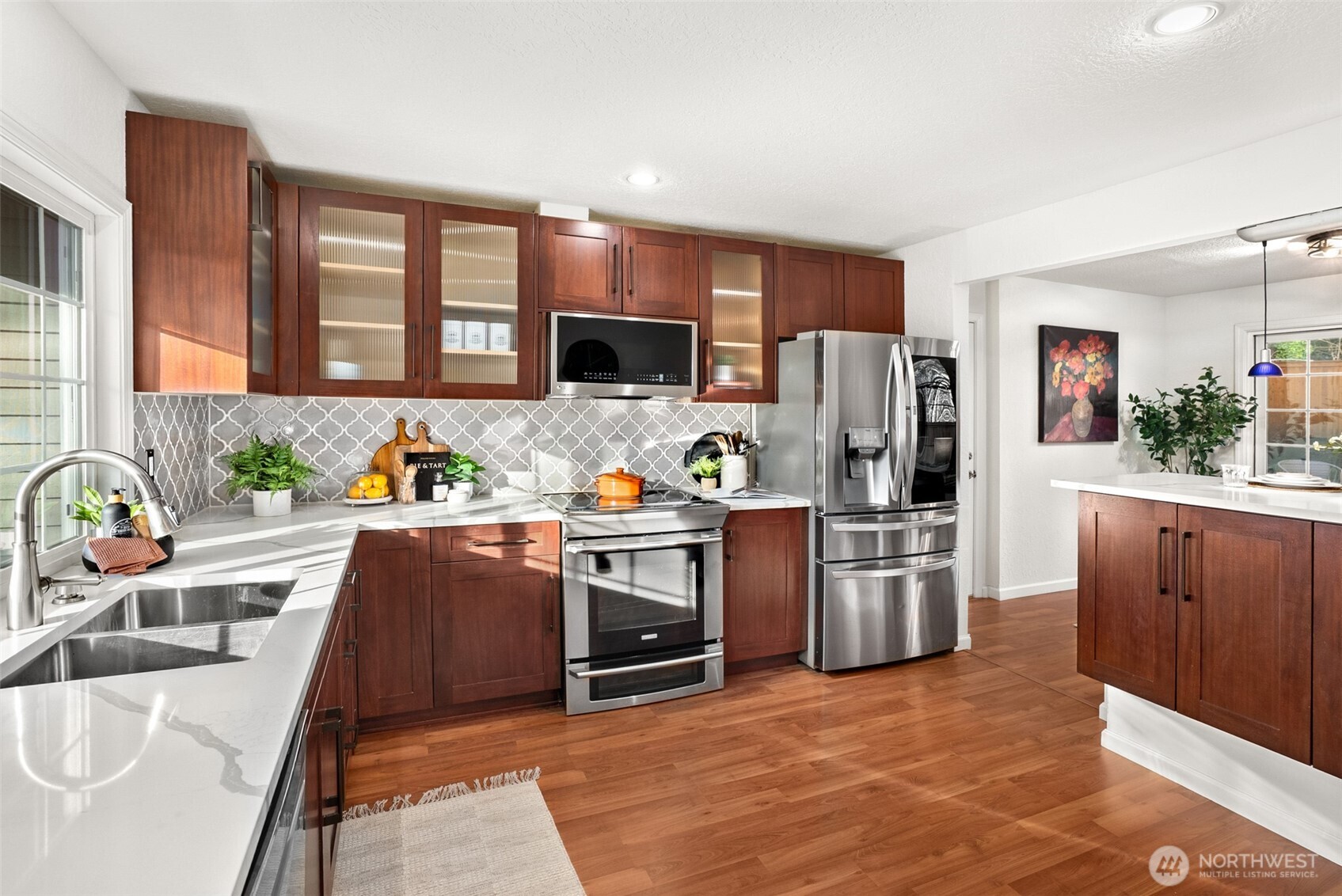 22709 12th Place West Bothell, WA 98021 - Photo 2 of 27 a kitchen with stainless steel appliances granite countertop a refrigerator stove and sink