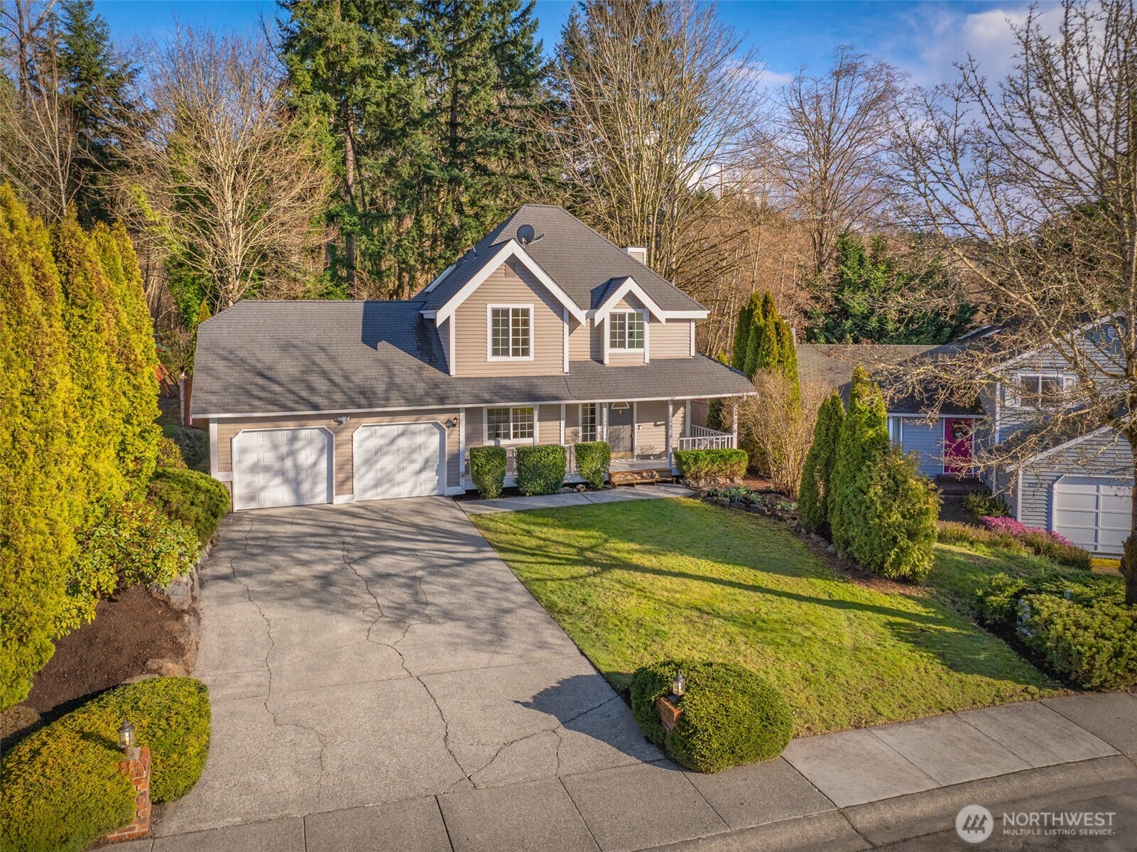 22709 12th Place West Bothell, WA 98021 - Photo 22 of 27 a front view of a house with yard and green space