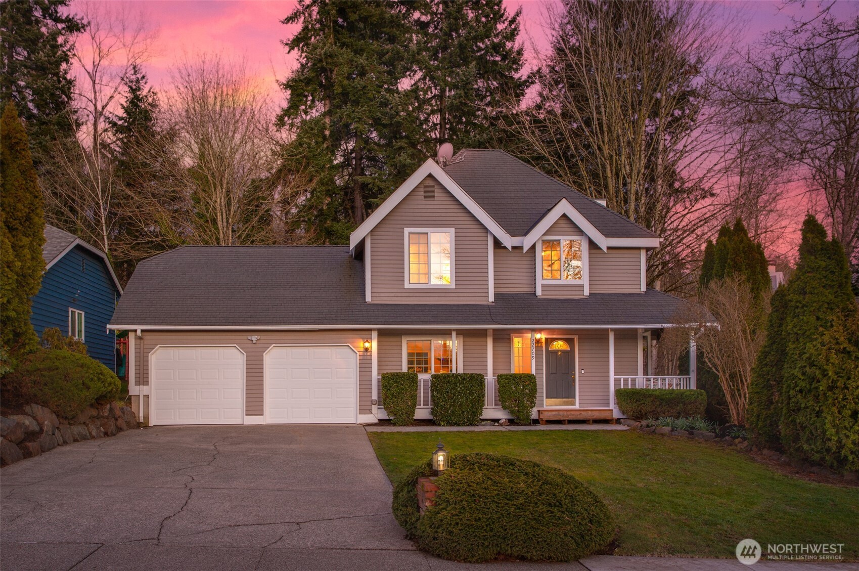 22709 12th Place West Bothell, WA 98021 - Photo 26 of 27 a front view of a house with a yard