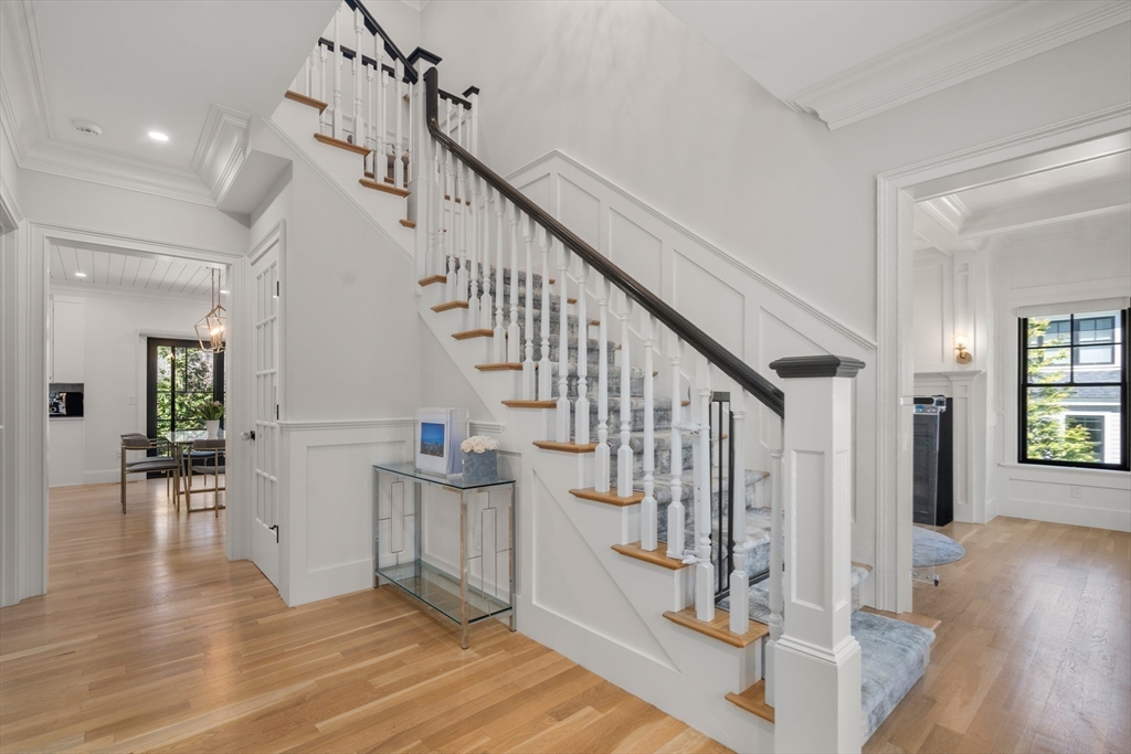 7 Massasoit Road Wellesley, MA 02481 - Photo 7 of 42 a view of entryway and hall with wooden floor