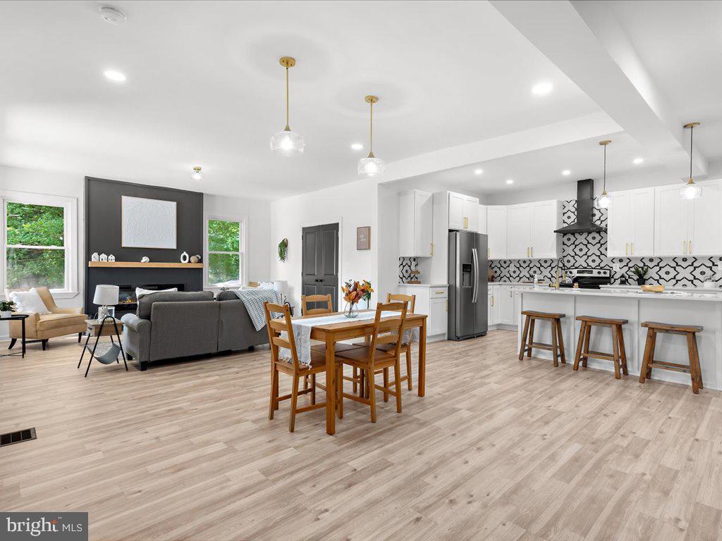 5212 Bush Street White Marsh, MD 21162 - Photo 2 of 49 Open Layout of Living, Kitchen and Dining