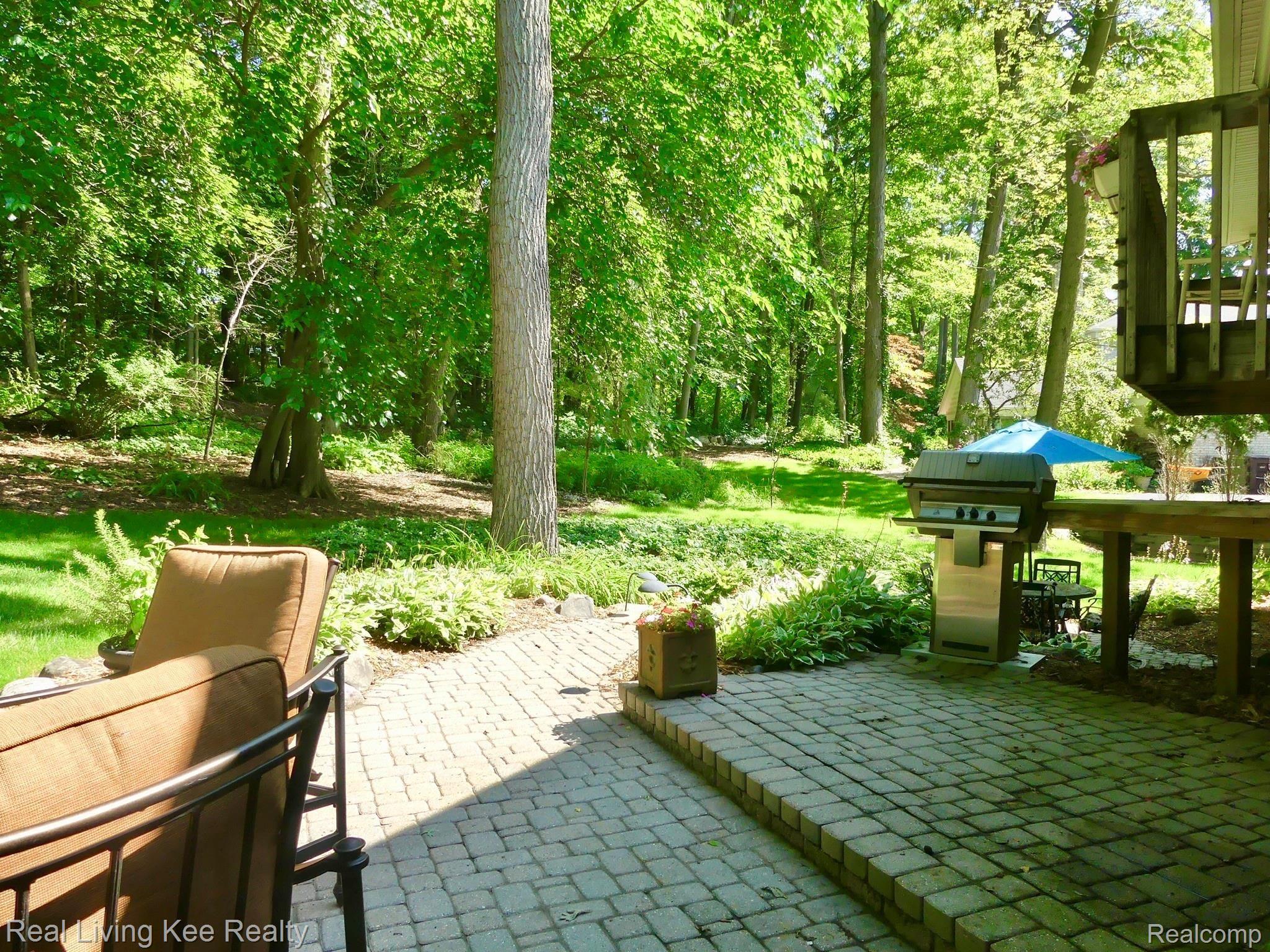 219 Beechview Drive Rochester, MI 48306 - Photo 54 of 64 Multi-tiered patio with gas grill