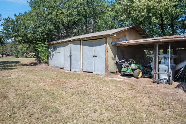 a view of a yard with a trees