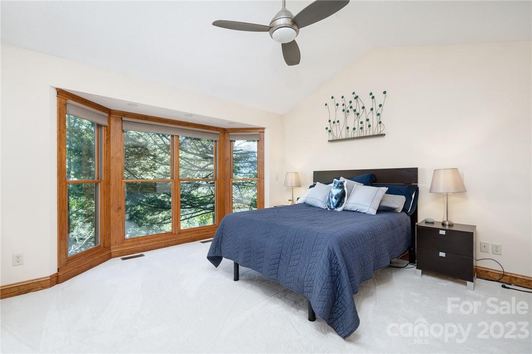 159 Deer Leap Marshall, NC 28753 - Photo 11 of 22 a bedroom with a bed and a large window