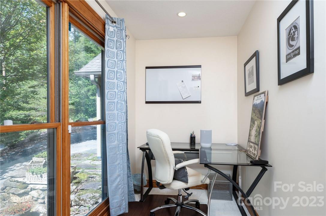 159 Deer Leap Marshall, NC 28753 - Photo 15 of 22 a view of a workspace with furniture and a window