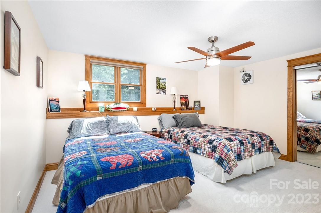 159 Deer Leap Marshall, NC 28753 - Photo 20 of 22 a bedroom with two beds and a large window