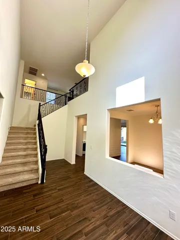 a view of a livingroom with wooden floor
