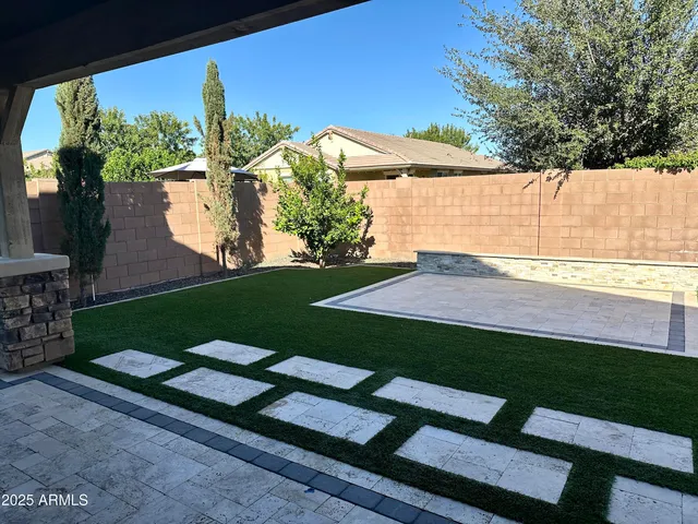 a view of a backyard with a garden