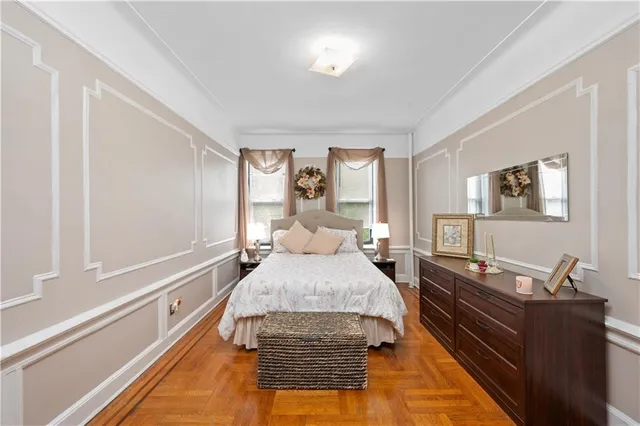 a bed room with a bed and a window