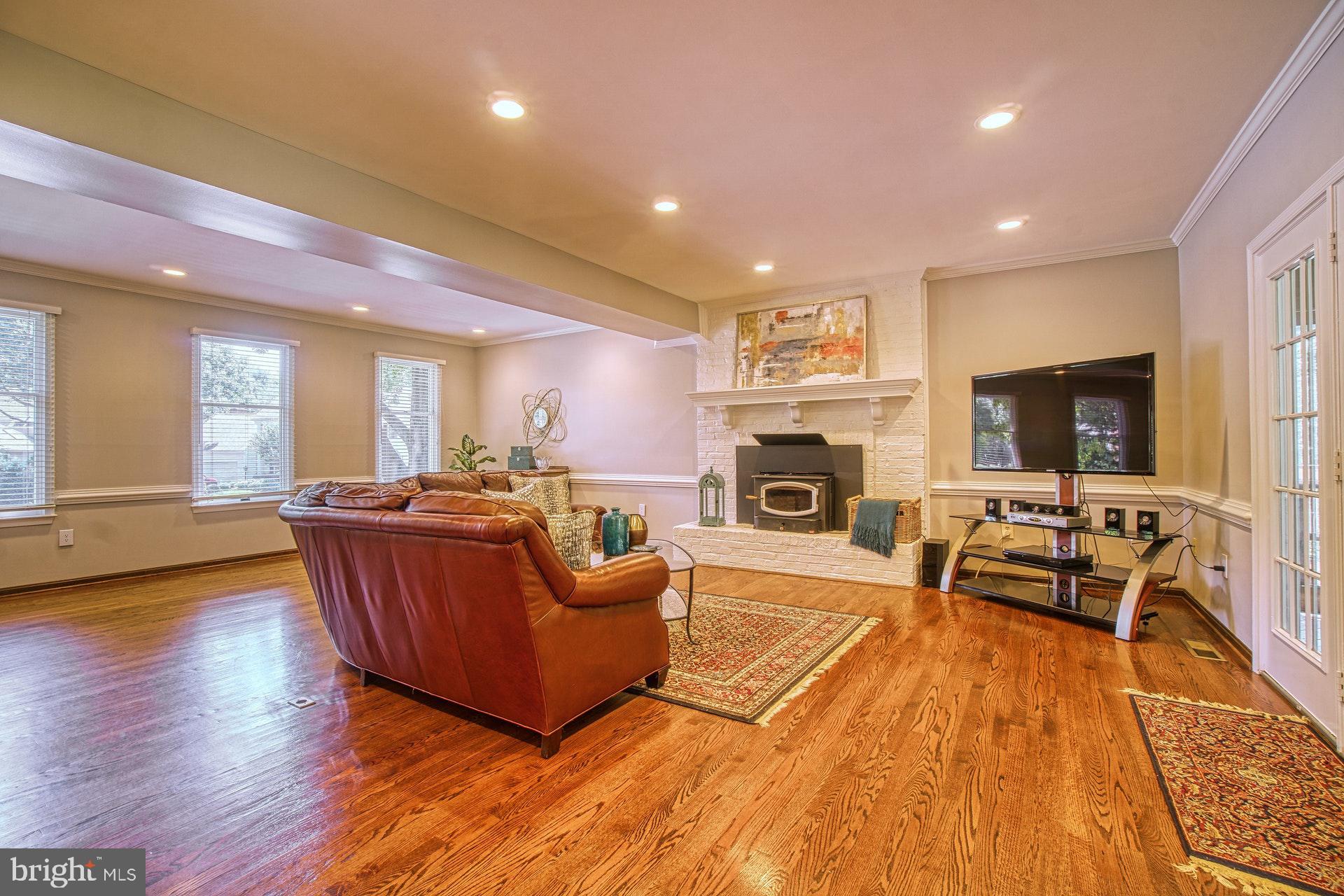 9312 Brian Run Lane Springfield, VA 22153 - Photo 5 of 42 Huge family room with wood burning stove
