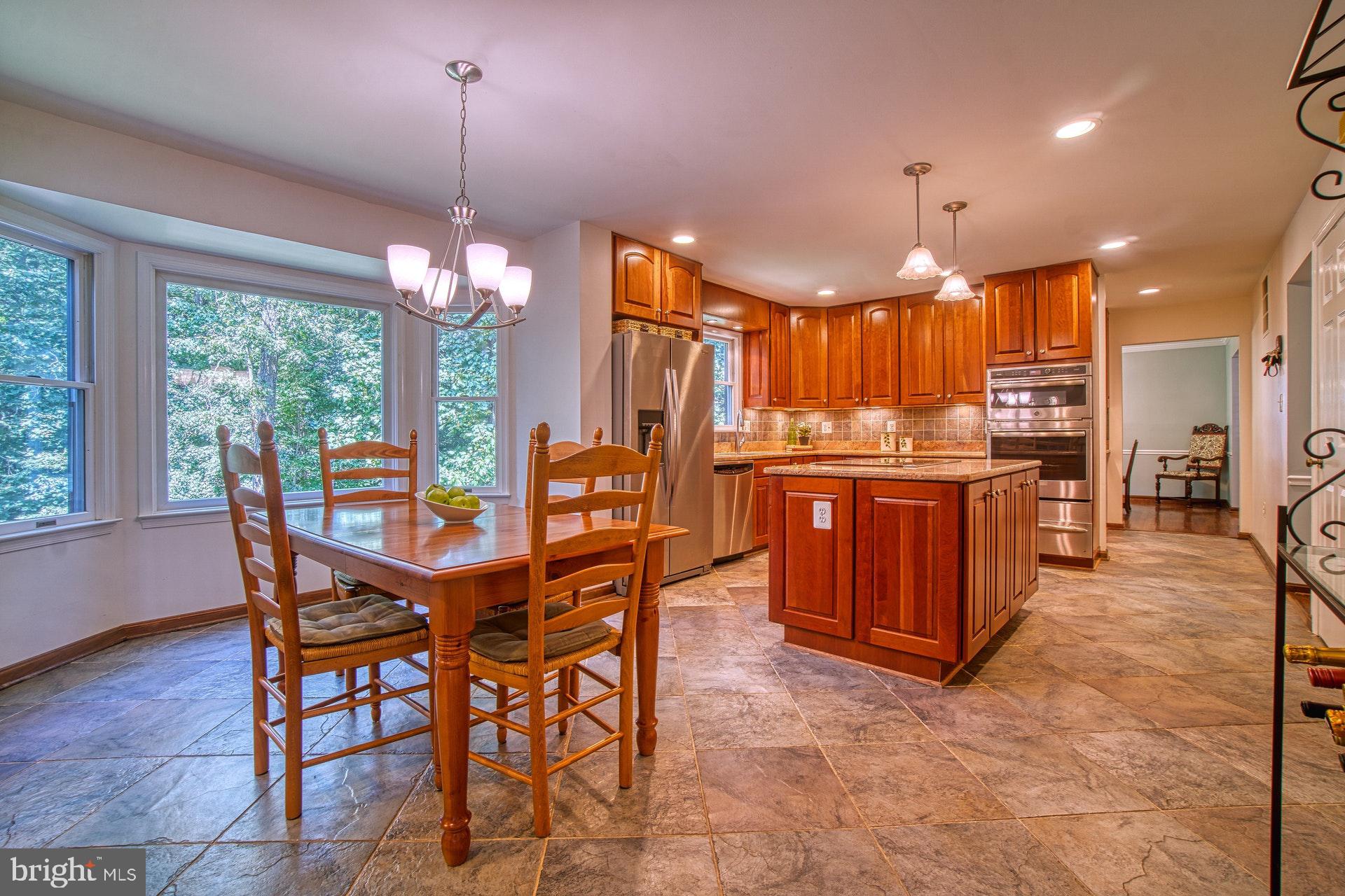 9312 Brian Run Lane Springfield, VA 22153 - Photo 9 of 42 Well-equipped kitchen with island and table space