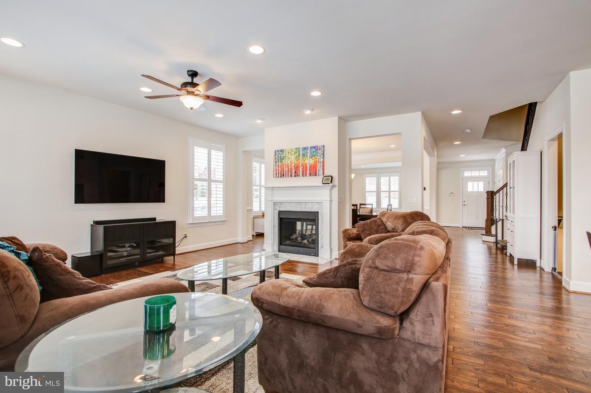 8391 Edward Carr Court Springfield, VA 22153 - Photo 14 of 67 Large open family room with gas fireplace