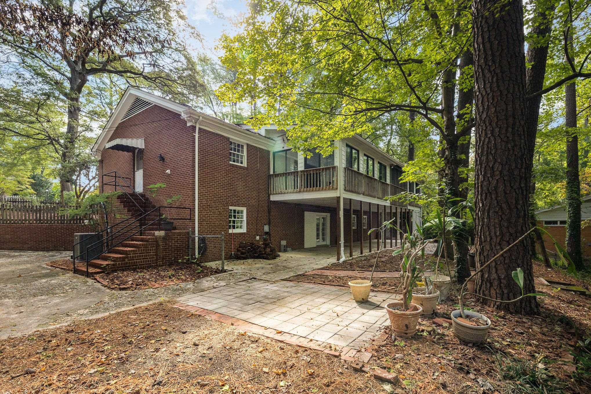 4921 Brookhaven Drive Raleigh, NC 27612 - Photo 29 of 39 One car Garage on left side of stairs with inside access as well. Garage
