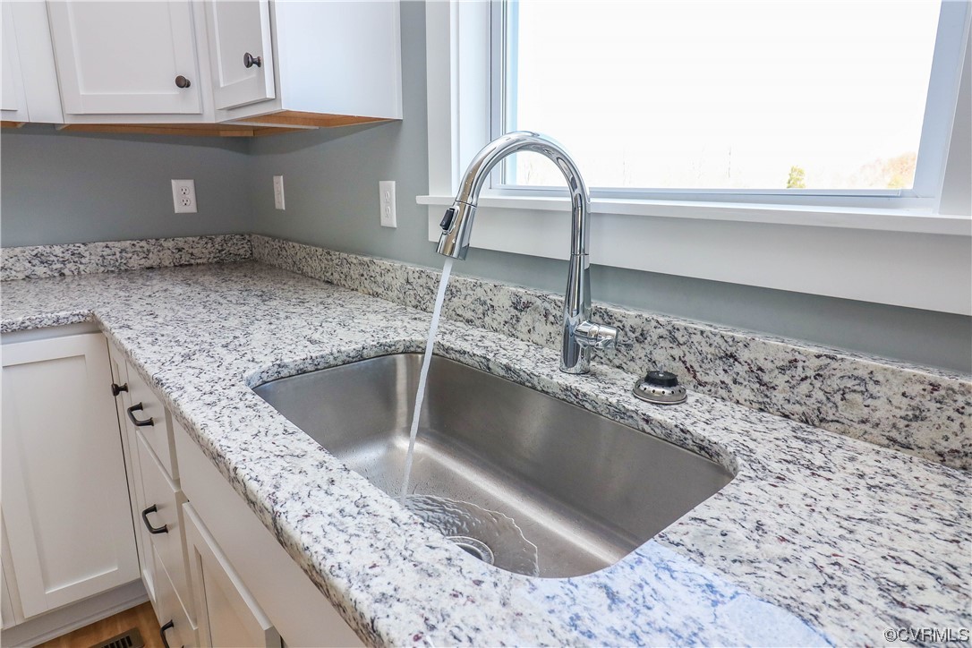 288 Moore Road Pamplin, VA 23958 - Photo 14 of 29 a kitchen with a sink and a stove top oven