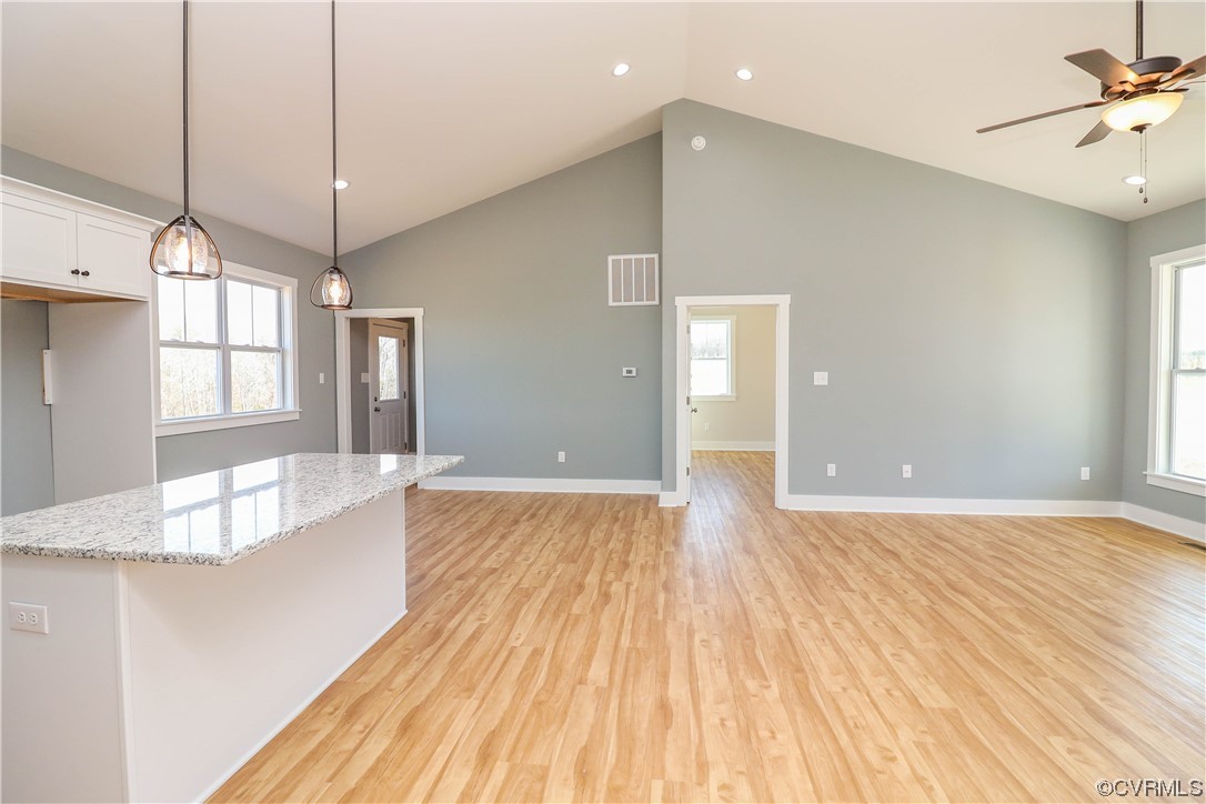 288 Moore Road Pamplin, VA 23958 - Photo 19 of 29 a view of an empty room with window and wooden floor