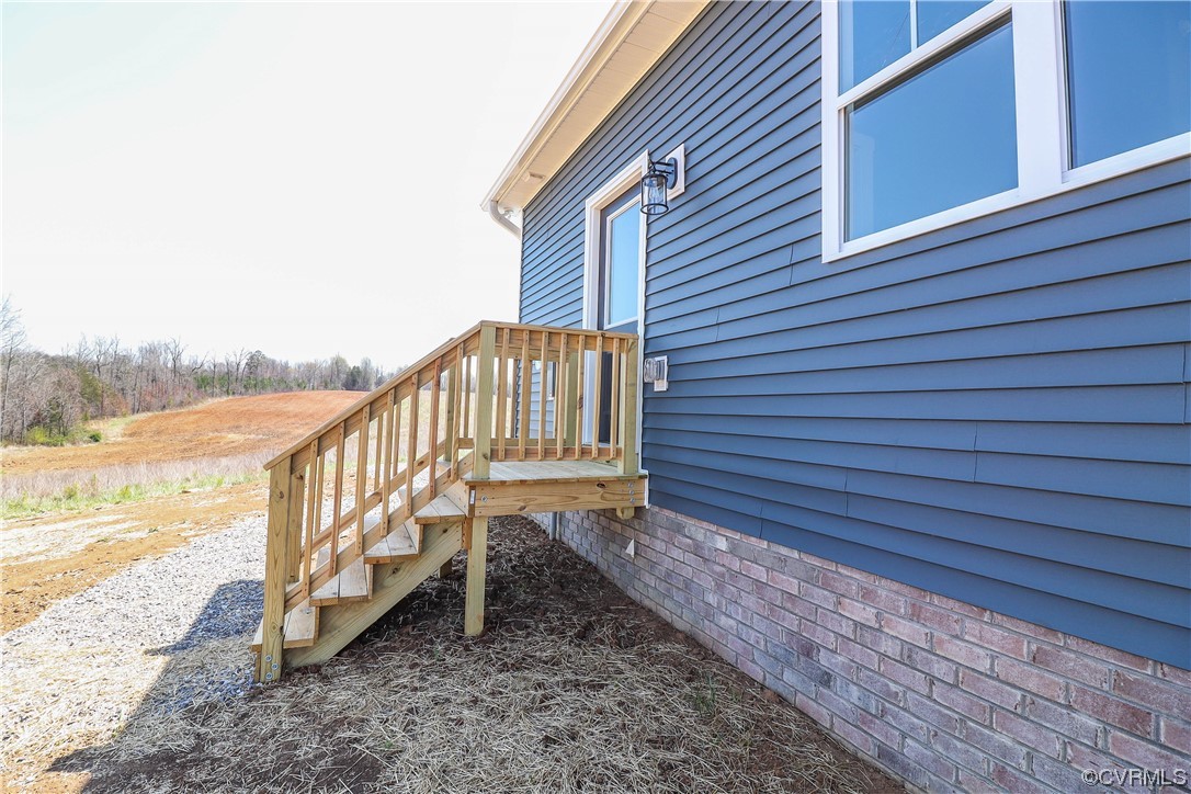 288 Moore Road Pamplin, VA 23958 - Photo 7 of 29 a view of a house with a yard and sitting area