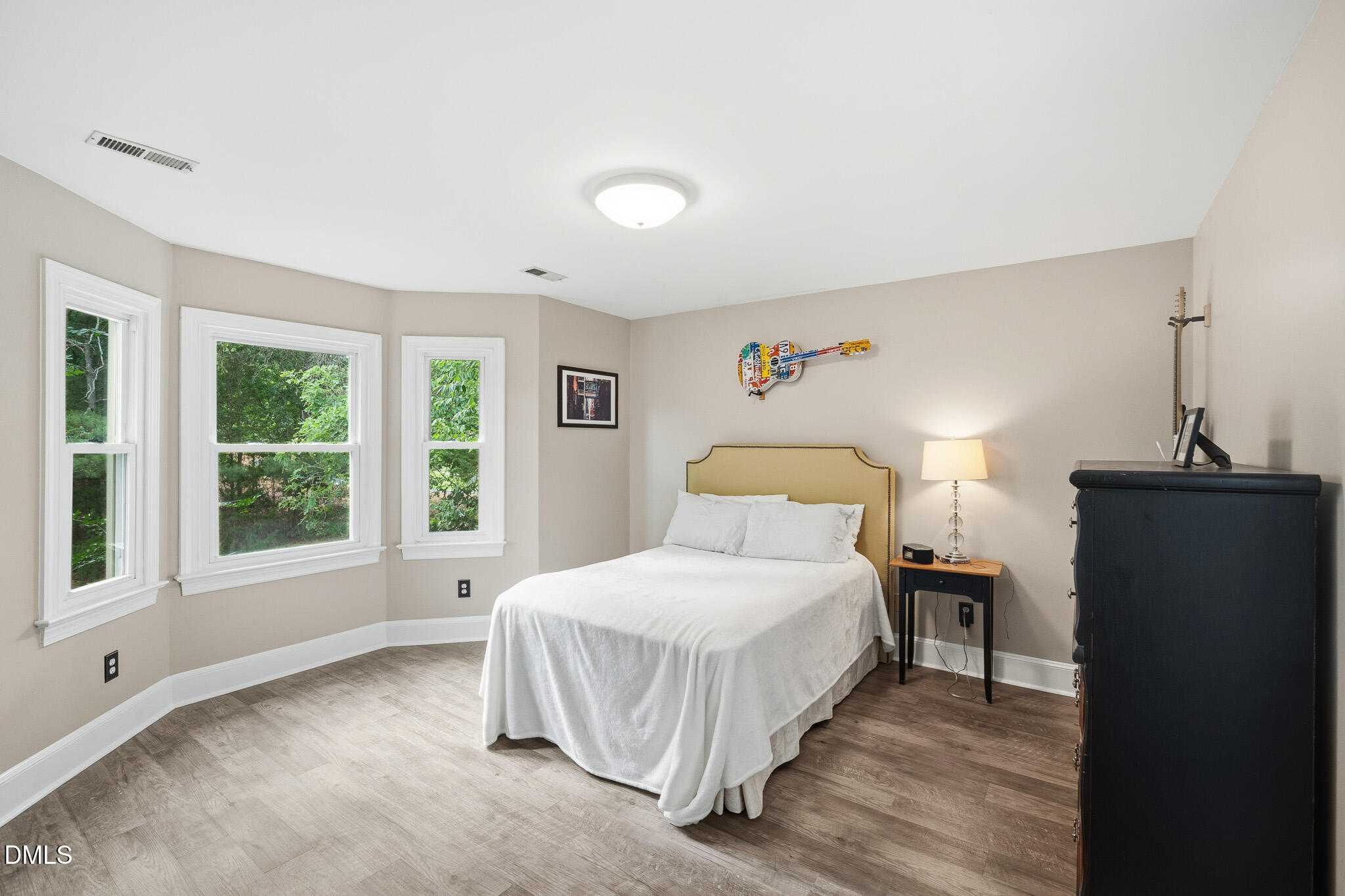 3735 Stoneybrook Drive Durham, NC 27705 - Photo 29 of 44 a bedroom with a bed and a window