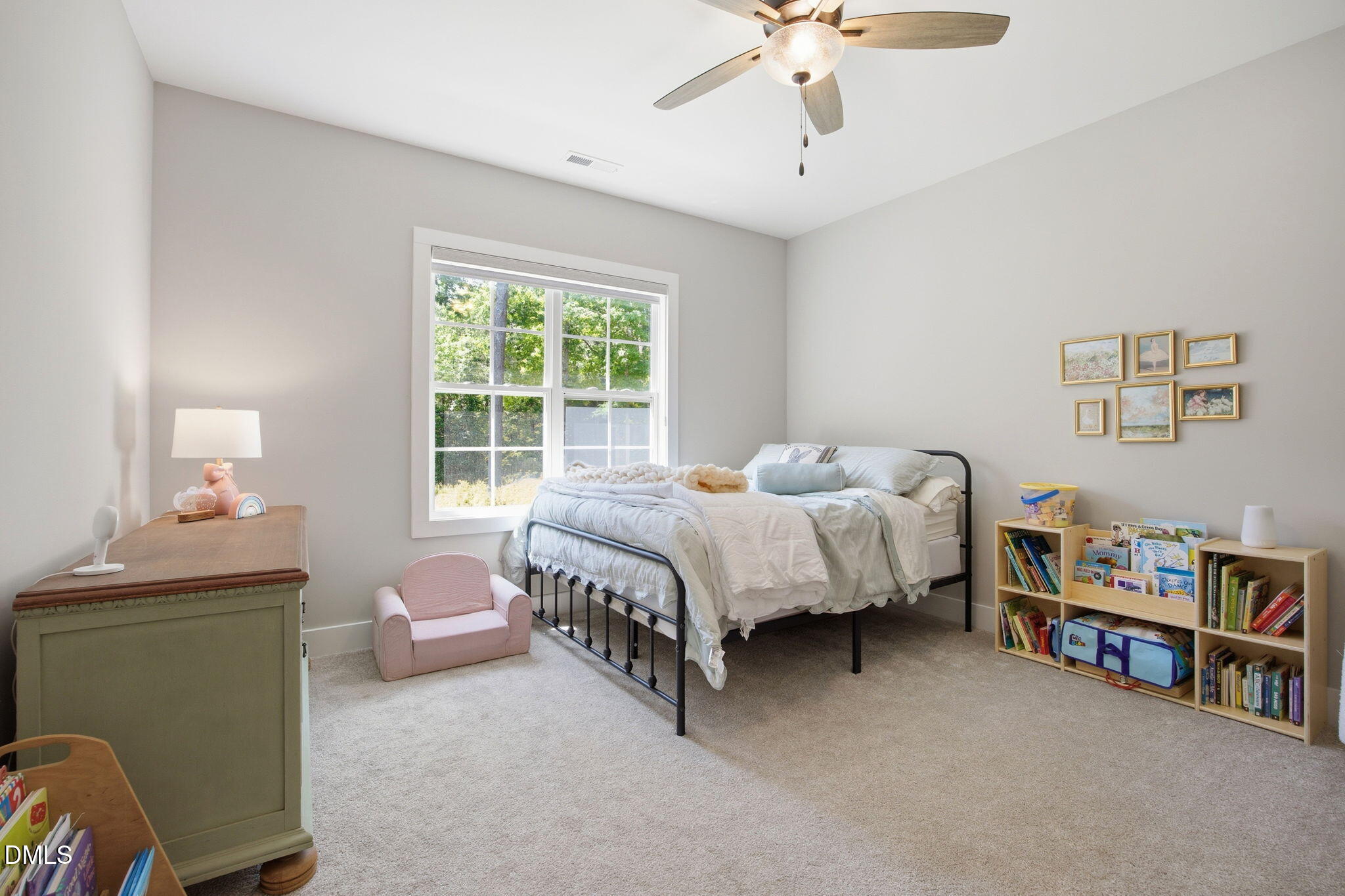 3511 Bruce Garner Road Wake Forest, NC 27587 - Photo 34 of 56 a bed room with a bed and a chair