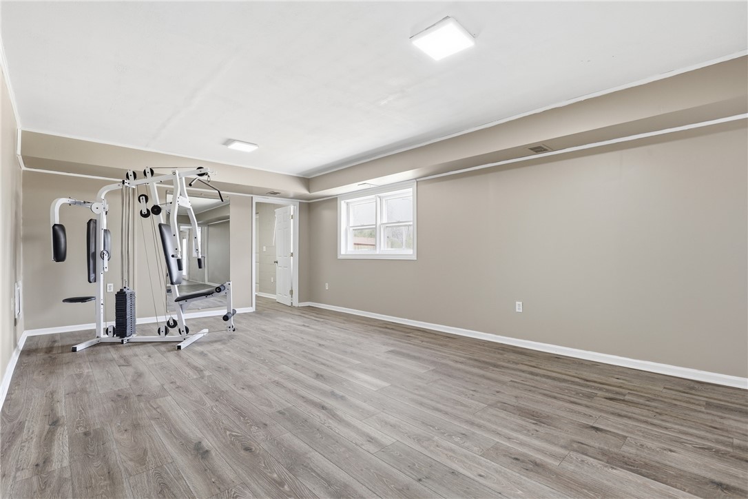4304 Old Buncombe Road Greenville, SC 29617 - Photo 26 of 49 This spacious room offers versatile usage, perfect for an exercise area or recreational activities.