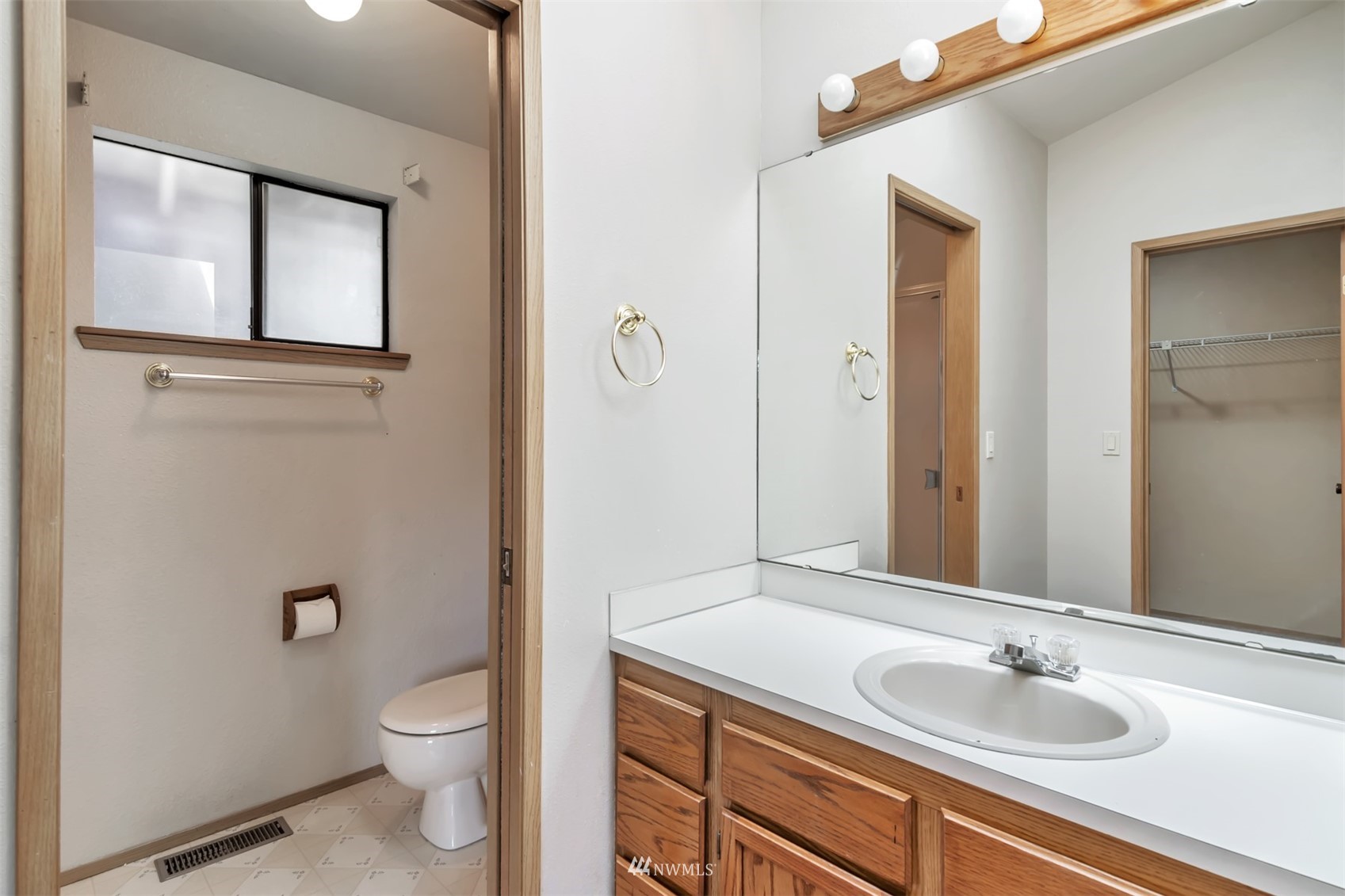 18221 26th Drive Southeast Bothell, WA 98012 - Photo 12 of 25 a bathroom with a sink toilet and shower