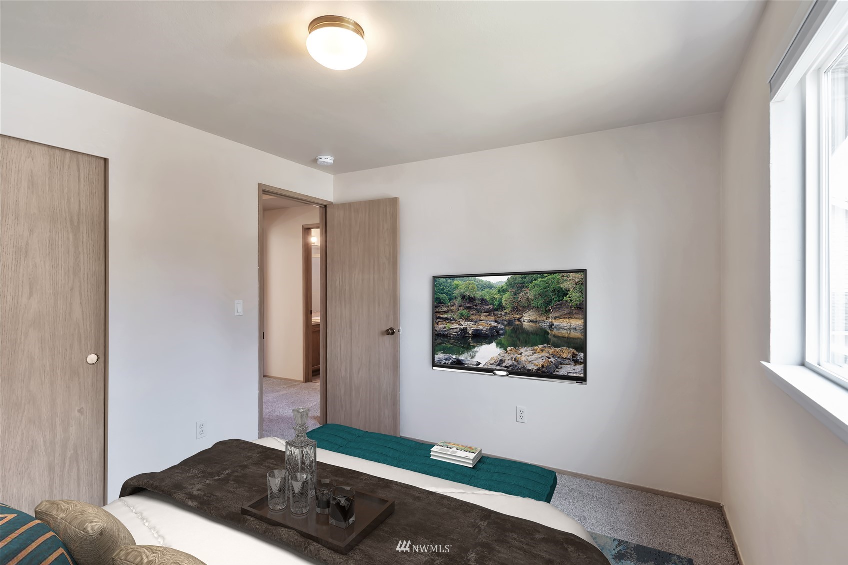 18221 26th Drive Southeast Bothell, WA 98012 - Photo 13 of 25 a bedroom with bed and window