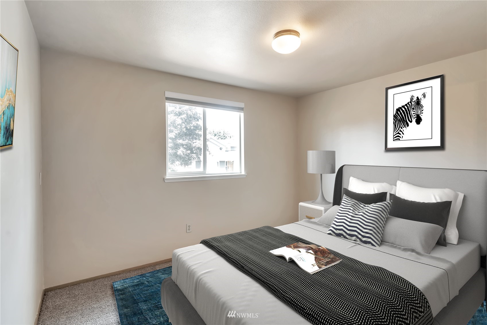 18221 26th Drive Southeast Bothell, WA 98012 - Photo 14 of 25 a bedroom with a bed and a window