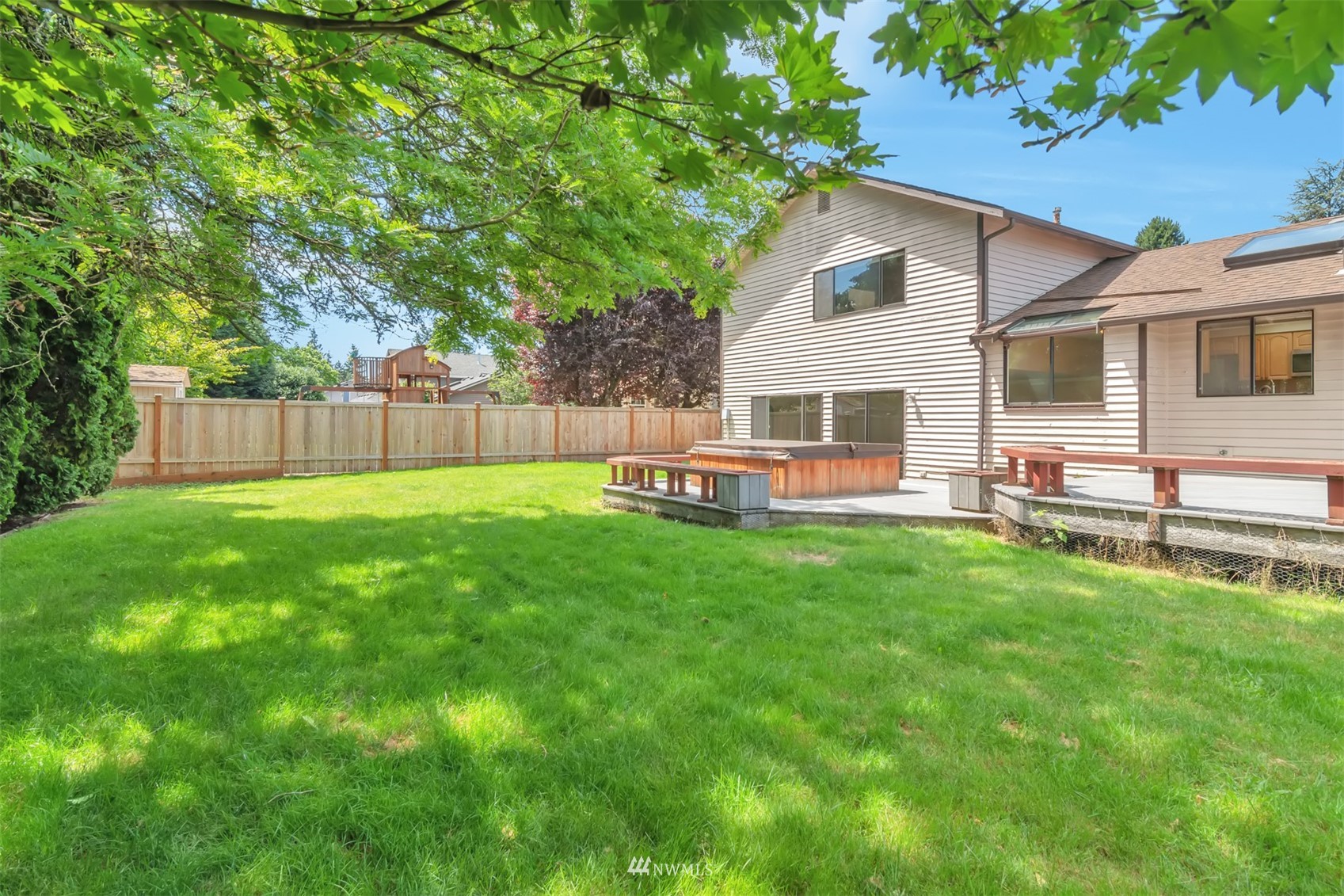 18221 26th Drive Southeast Bothell, WA 98012 - Photo 20 of 25 a view of a house with a backyard and a tree