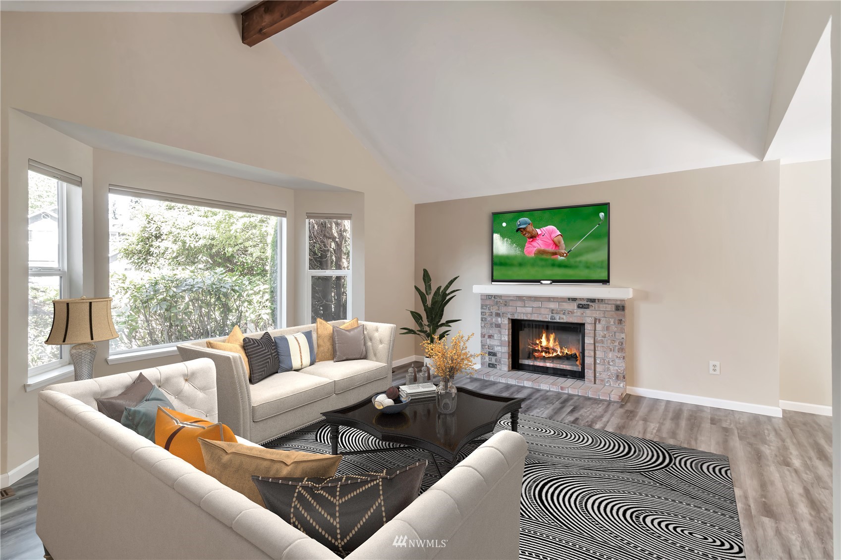 18221 26th Drive Southeast Bothell, WA 98012 - Photo 4 of 25 a living room with furniture and a fireplace