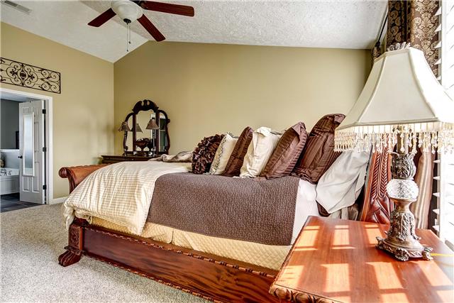 4011 Timber Ridge Court Mount Juliet, TN 37122 - Photo 10 of 20 a bedroom with a bed and walk in closet