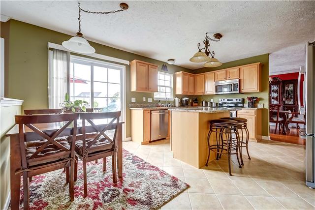 4011 Timber Ridge Court Mount Juliet, TN 37122 - Photo 5 of 20 a view of a dining room with furniture window and wooden floor