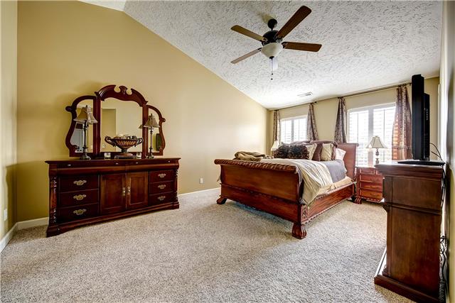 4011 Timber Ridge Court Mount Juliet, TN 37122 - Photo 9 of 20 a bedroom with a bed and a dresser