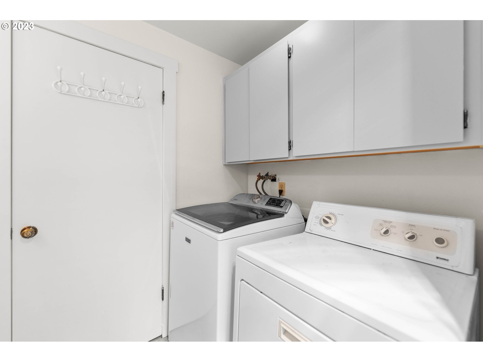 11856 Southeast Morrison Street Portland, OR 97216 - Photo 18 of 26 a utility room with dryer and washer