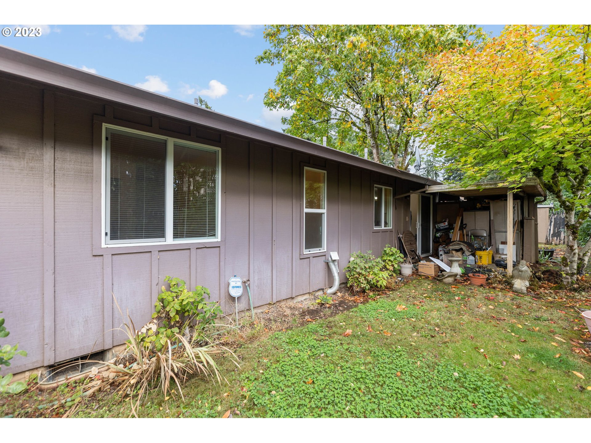 11856 Southeast Morrison Street Portland, OR 97216 - Photo 24 of 26 a backyard of a house with yard and outdoor seating