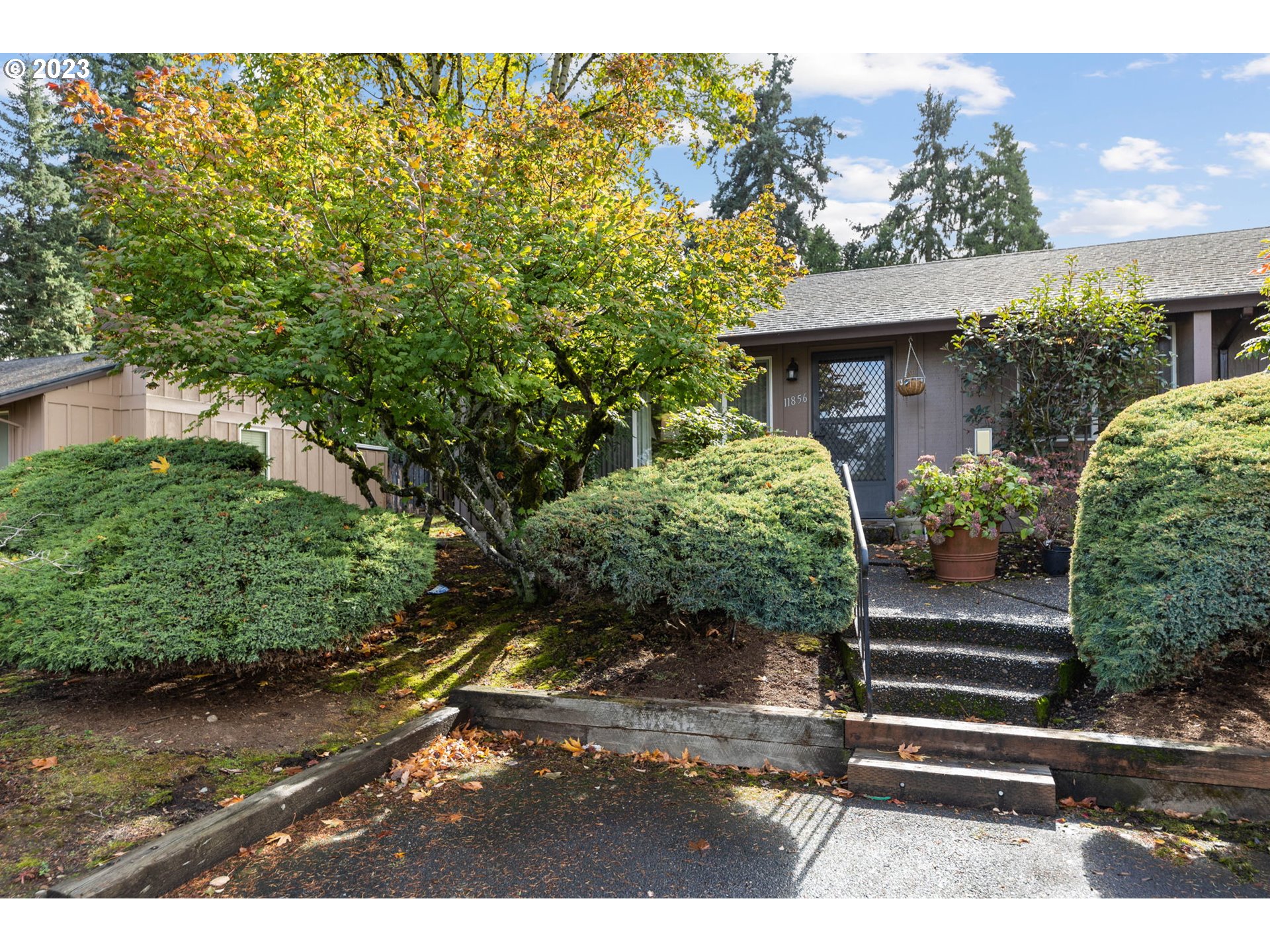 11856 Southeast Morrison Street Portland, OR 97216 - Photo 3 of 26 a view of a backyard