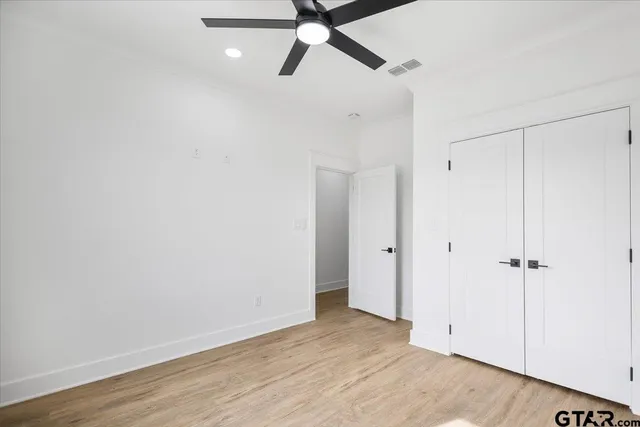 a bathroom with a bathtub shower sink and toilet
