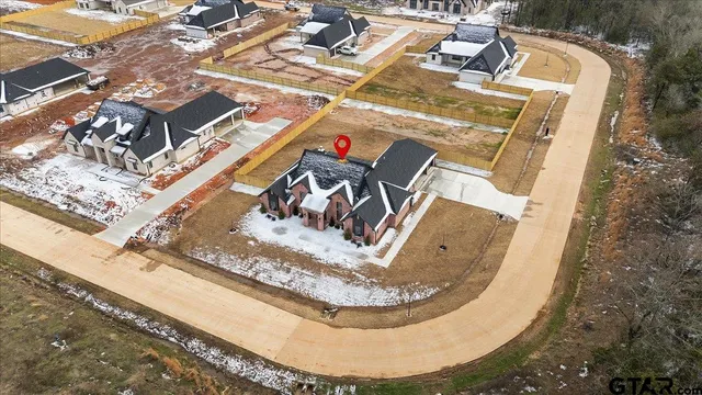 a view of a pool with a yard