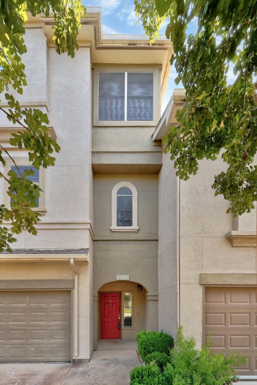 11203 Ranch Road 2222, Unit 1105 Austin, TX 78730 - Photo 4 of 35 a front view of a house with garden